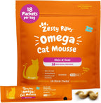 Cat enjoying Zesty Paws Omega Cat Mousse treat