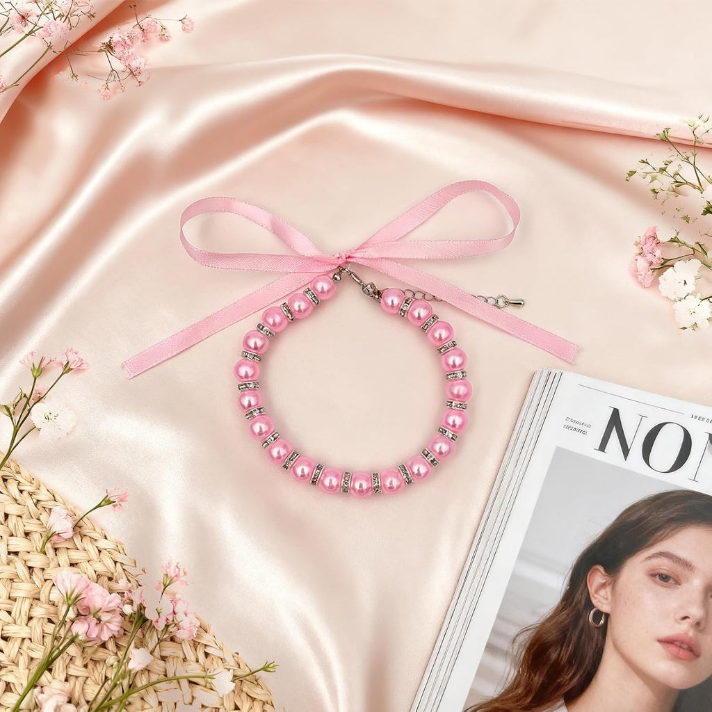 Packaging view of the imported pink pearl pet costume necklace accessory.