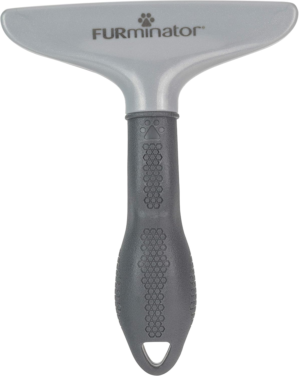 FURminator grooming rake removing loose pet hair