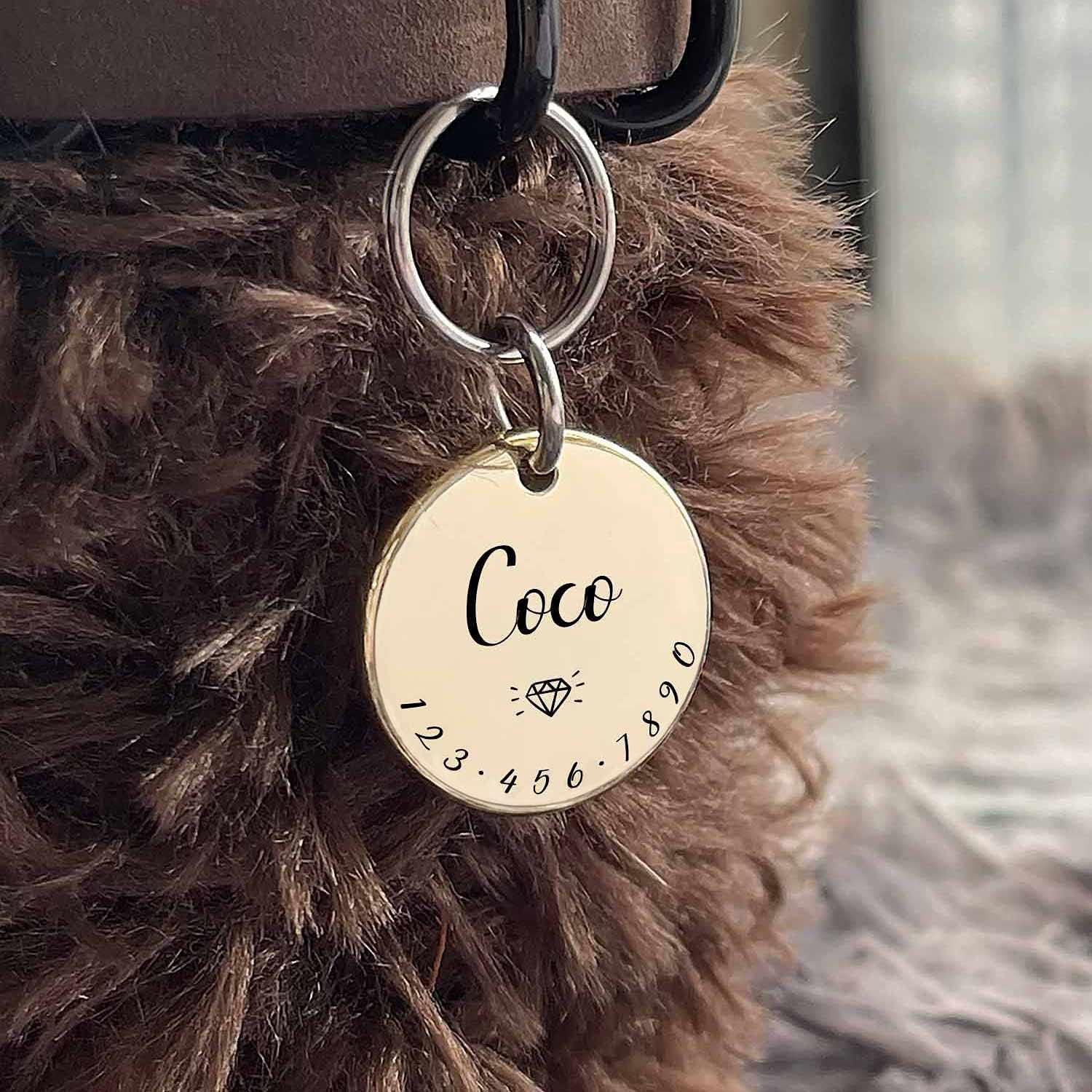 Acatinthetree personalized pet necklace tag complete with split rings and safety bell attachment.