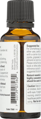 Side perspective of NOW Foods lavender oil highlighting its one fluid ounce volume statement