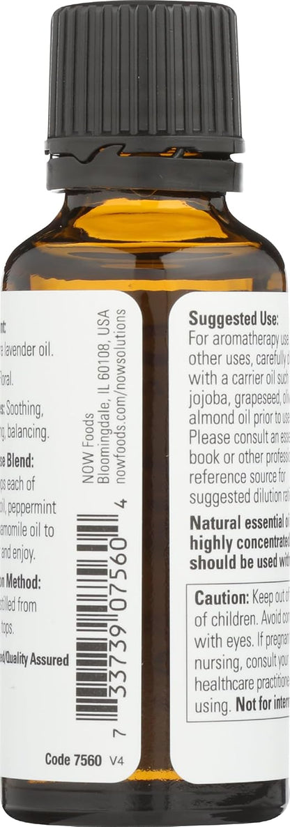 Side perspective of NOW Foods lavender oil highlighting its one fluid ounce volume statement