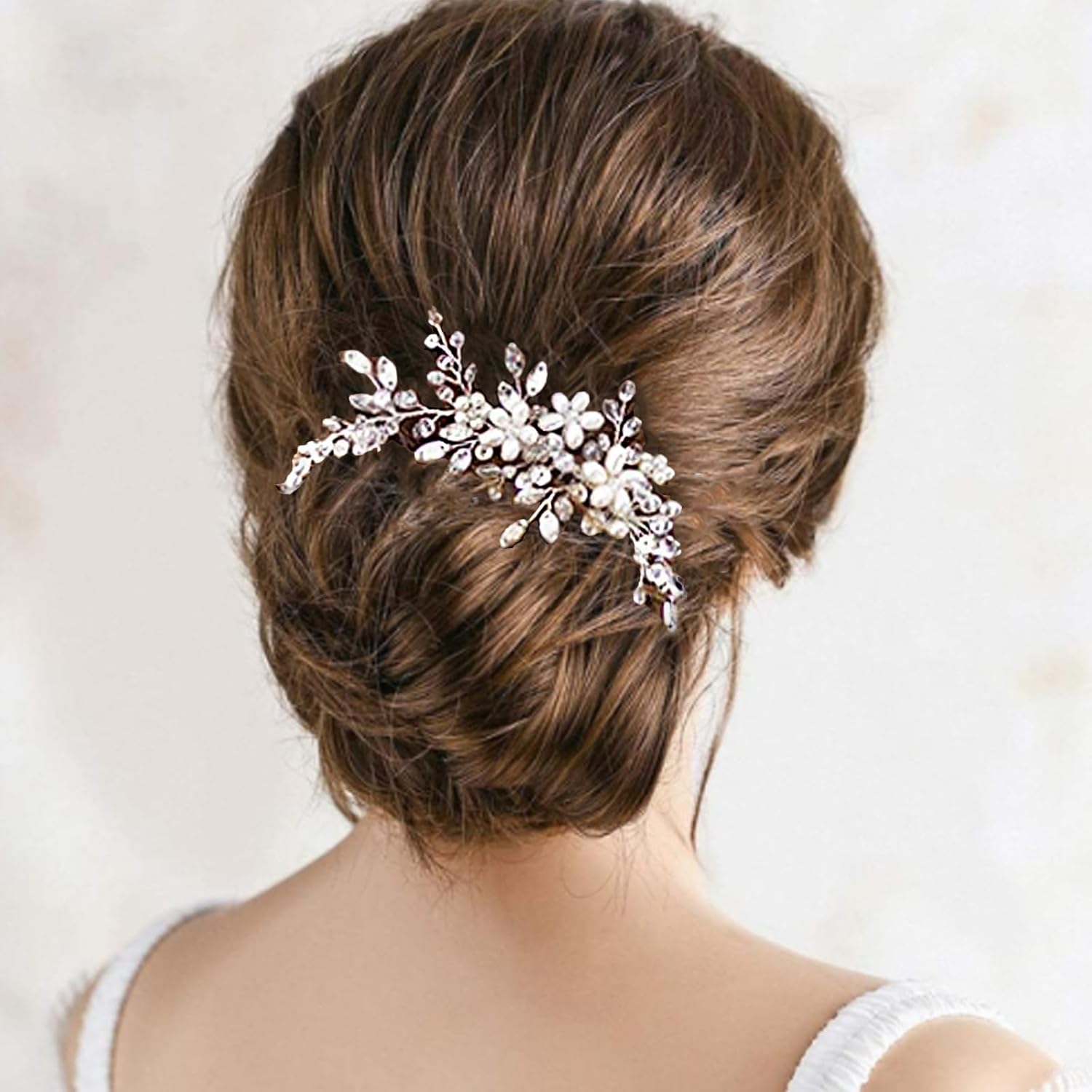 Tatibana bride wedding hair comb silver front view showcasing crystal flowers and pearl details.