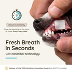Furlicks dissolving breath freshener strip being applied to a dog's tongue