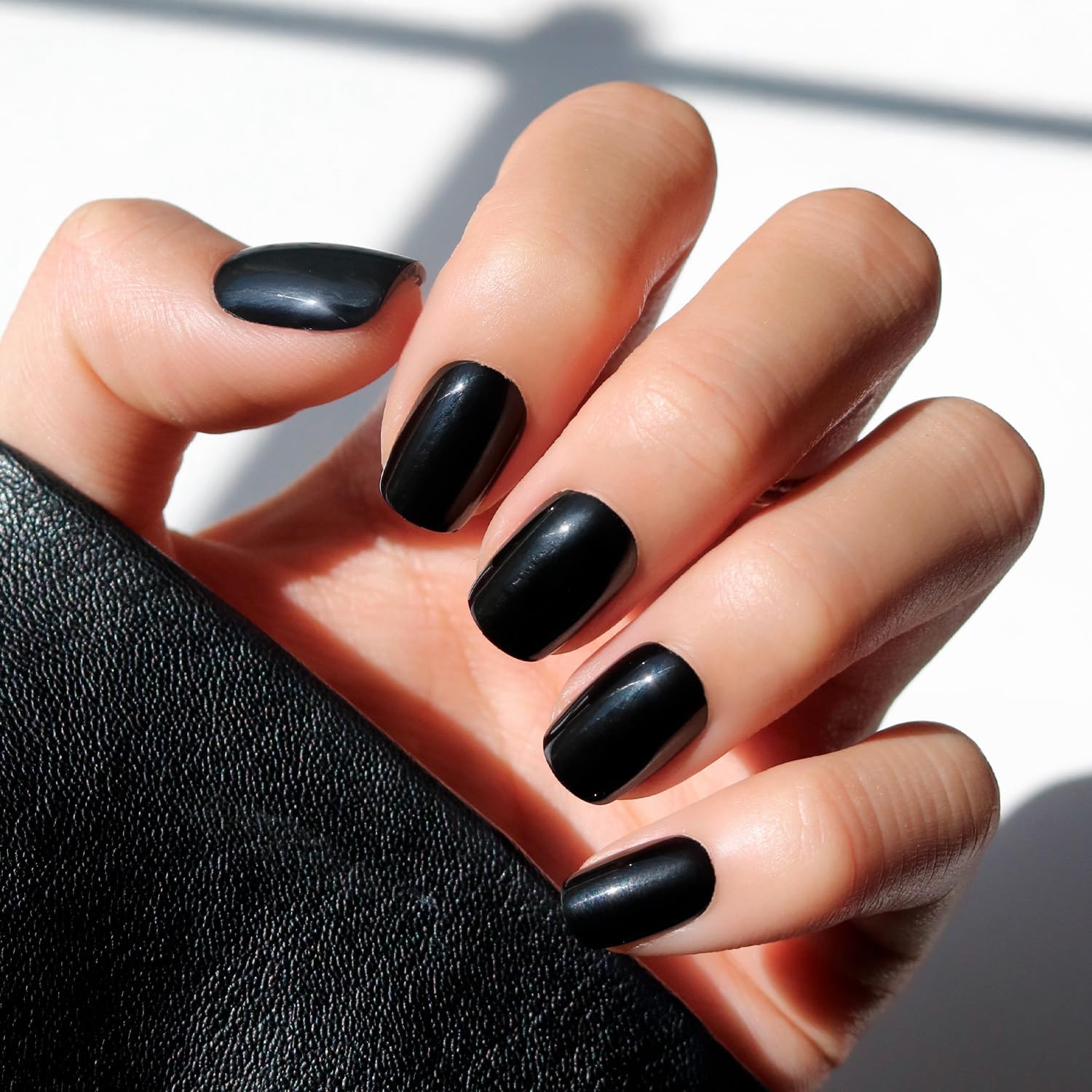 Glamnetic Jet Black short squoval press on nails front view