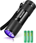Morpilot compact UV torch detecting scorpions in a dark outdoor environment