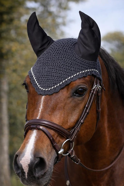 Side profile of horse wearing charcoal gray fly bonnet
