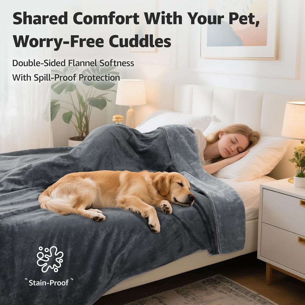 Reversible leakproof love blanket spread over a twin size bed mattress
