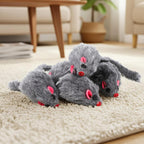 Indoor cat self play mouse toy with soft plush material texture closeup.