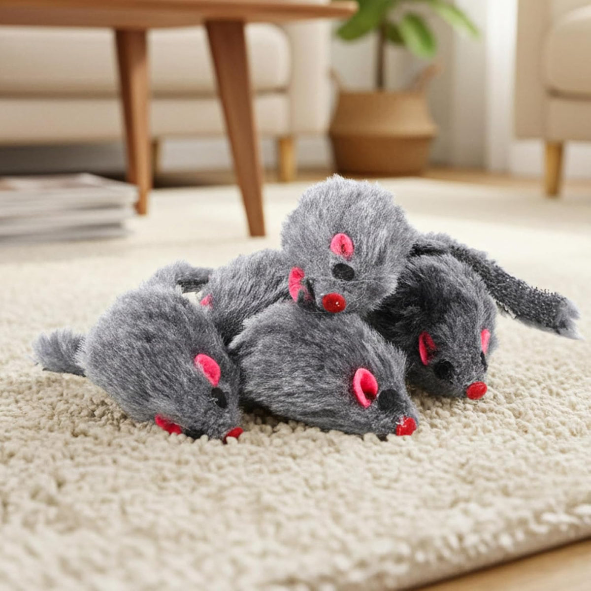 Indoor cat self play mouse toy with soft plush material texture closeup.