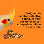 Cockatiel eating Kaytee Fiesta nutritious gourmet blend from a bowl.