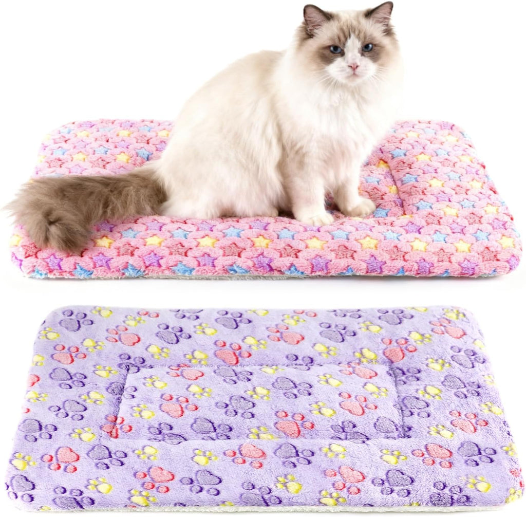 Folded stack of two machine washable HeNdShe flannel blankets for small pets.