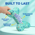 Small dog playing fetch with the PrimePets plush bone toy