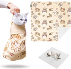 A small dog wrapped in the Kiorafoto self adhesive restraint blanket for ear cleaning