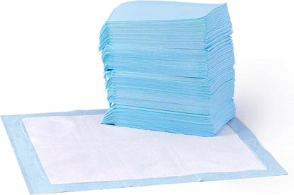 Housebreaking puppy pads spread out in a home living room