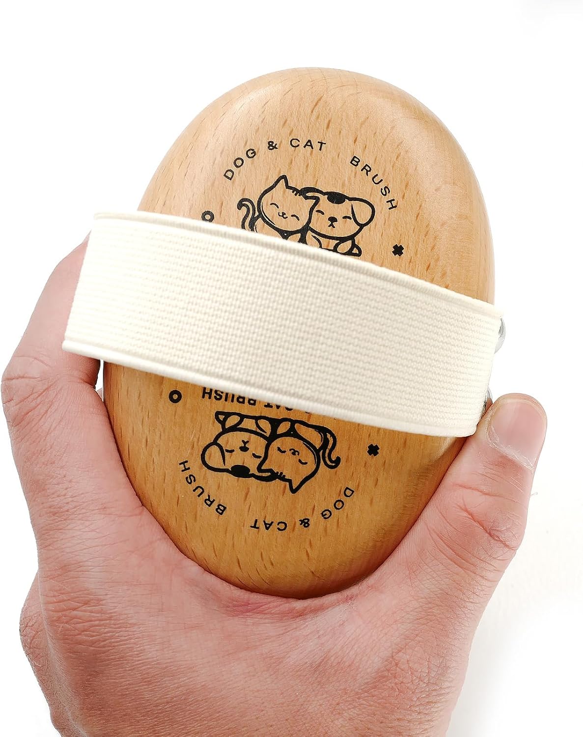 Menesia gentle grooming brush for short haired dogs and cats on a clean background.