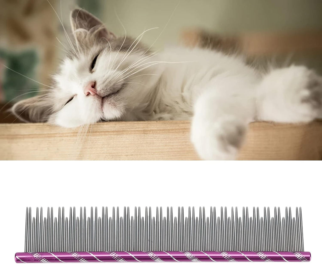 Zerodis cat grooming comb held in hand for scale