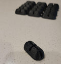 Close up of 3dArtByDesign non-slip black kennel floor pads