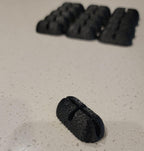Close up of 3dArtByDesign non-slip black kennel floor pads