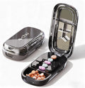 Ptyism adjustable pill cutter splitter front view showing beige exterior design