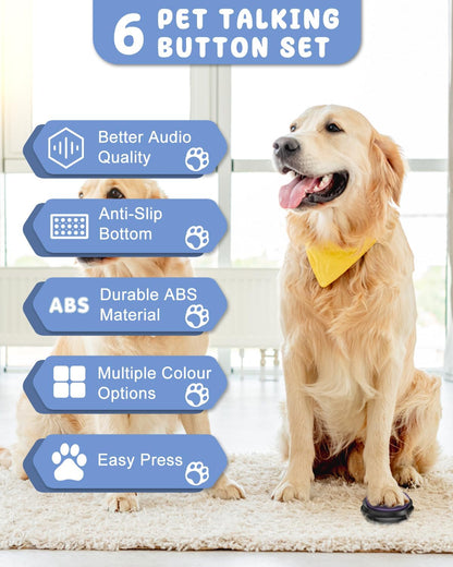 Six multi colored recordable pet training buzzers neatly organized on a black rubber mat.