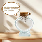 COSOWO sympathy gift package layout featuring the heart glass bottle, cork stopper, and silver charms.