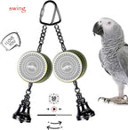 Educational bird toy hanging inside a parrot cage setting.