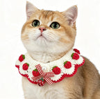Artisan knit cat bandana collar showing the detailed gingham bow tie and pearl accents