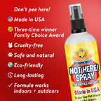 Pet owner applying Bodhi Dog training spray on carpet