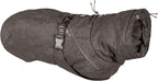 Dog wearing Hurtta Expedition Parka in winter setting