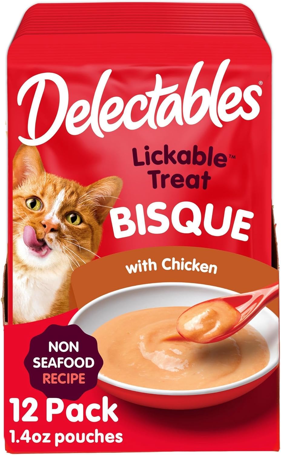 Creamy non seafood bisque cat treat pouch being poured into a pet bowl