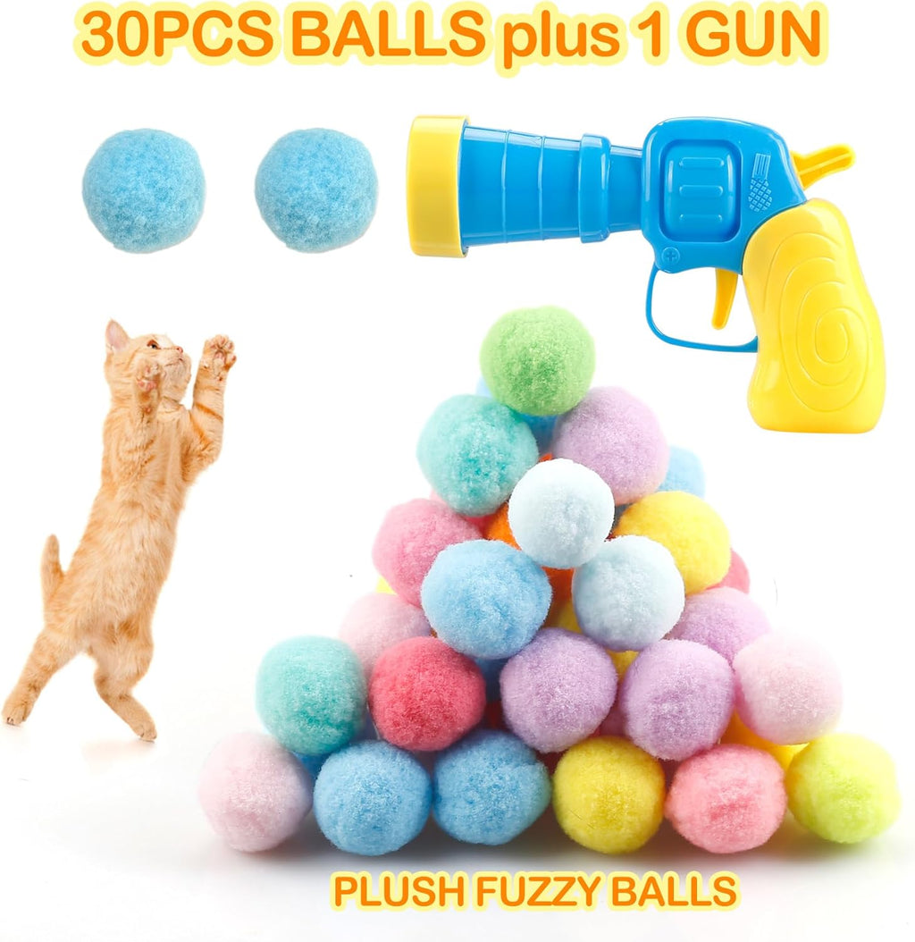 A person loading a nylon pom pom ball into the MeoHui cat toy launcher.