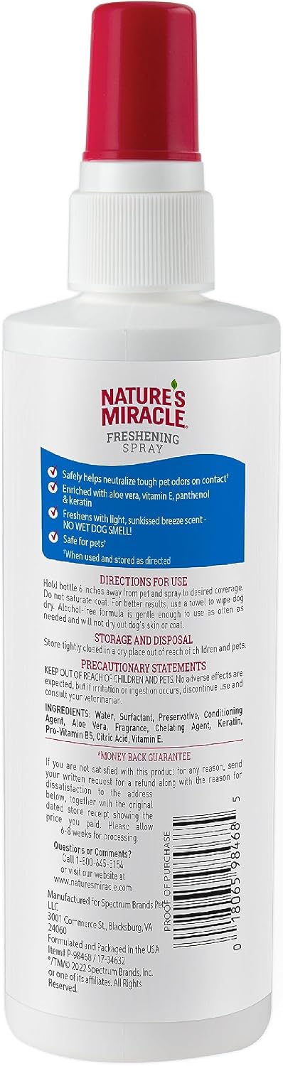 Nature's Miracle Sunkissed Breeze spray application on dog
