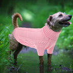 Close up of high density acrylic yarn fabric on pink pet sweater