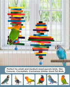 Detail shot of food-grade colored wooden pieces on bird toy