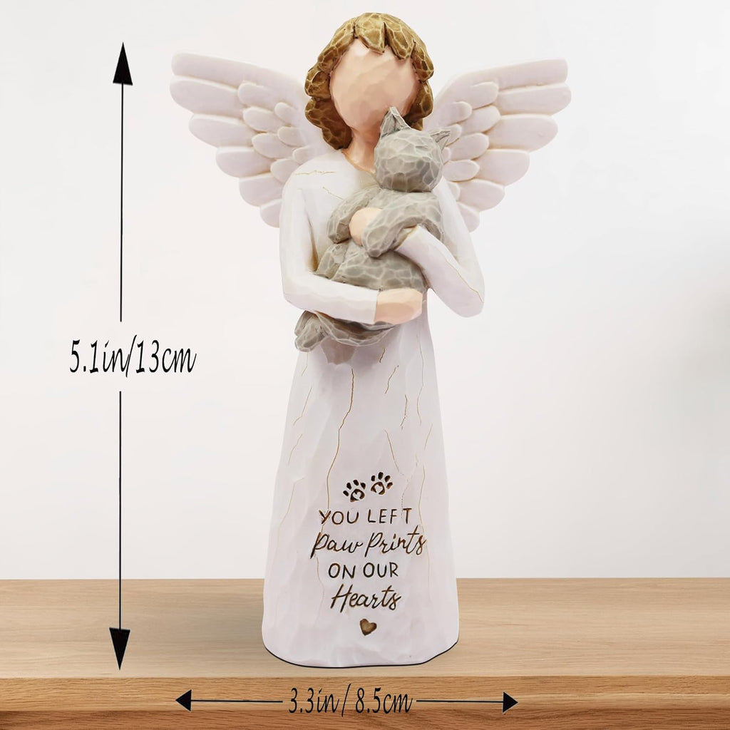Resin cat angel figurine displayed on a living room shelf