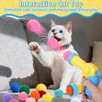 Two Mity Rain cat ball launchers side by side