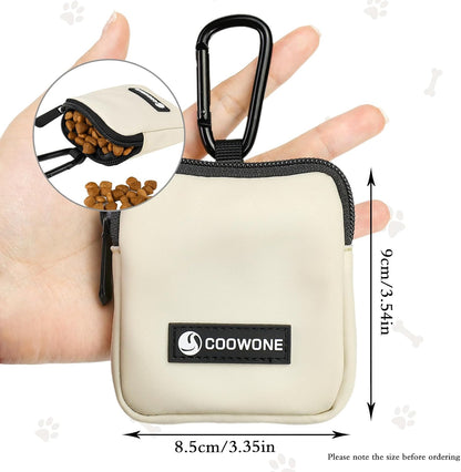 Coowone hands free pet reward bag attached securely to a human belt loop for outdoor walks.