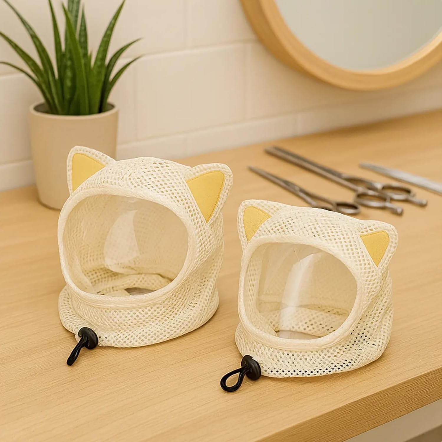White mesh cat muzzle mask for anti licking and anti scratching protection.