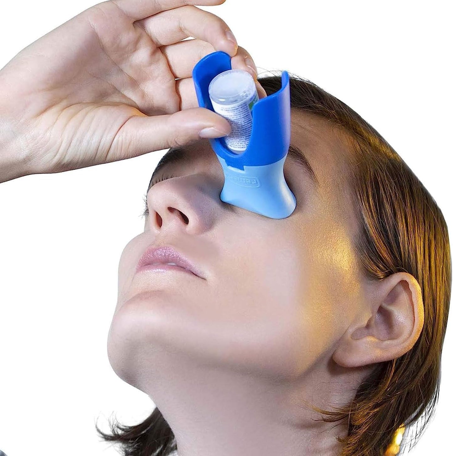 Remedic Eye Drop Guide front view highlighting the blue silicone adapter on an eye drop bottle