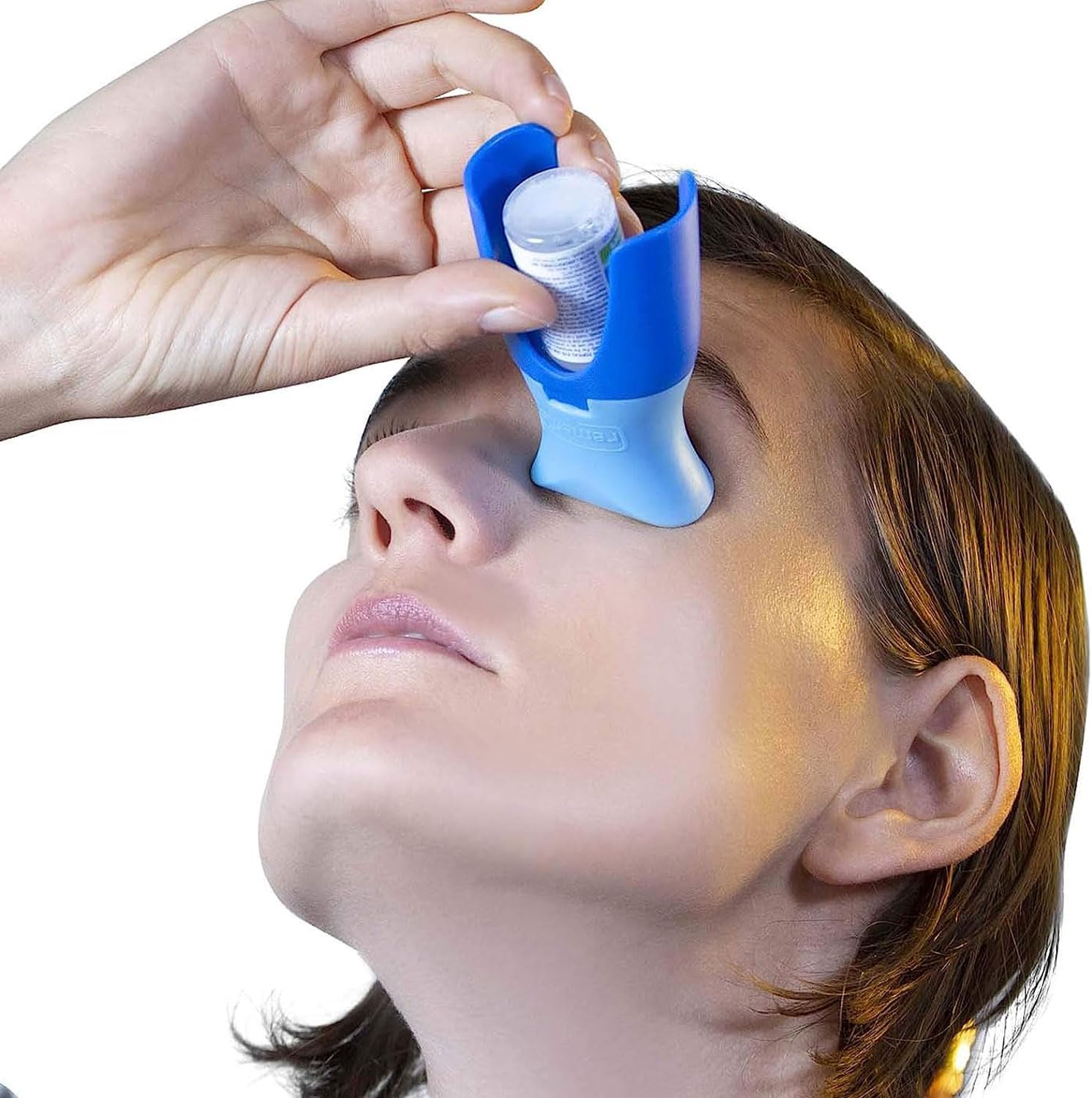 Remedic Eye Drop Guide front view highlighting the blue silicone adapter on an eye drop bottle