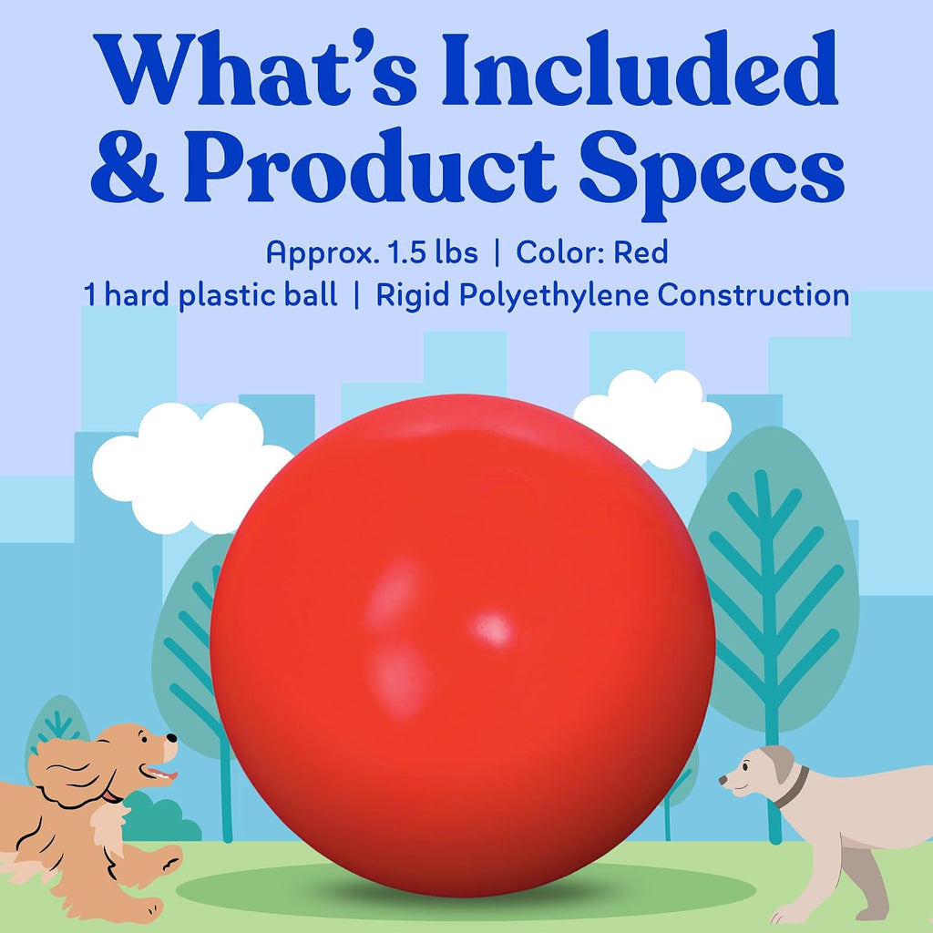 Dog pushing large red interactive ball outdoors