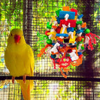 Close up of Rypet parrot toy cotton rope knots and wood blocks.