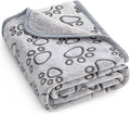 Stuffed premium soft dog blanket front view showing grey paw print design