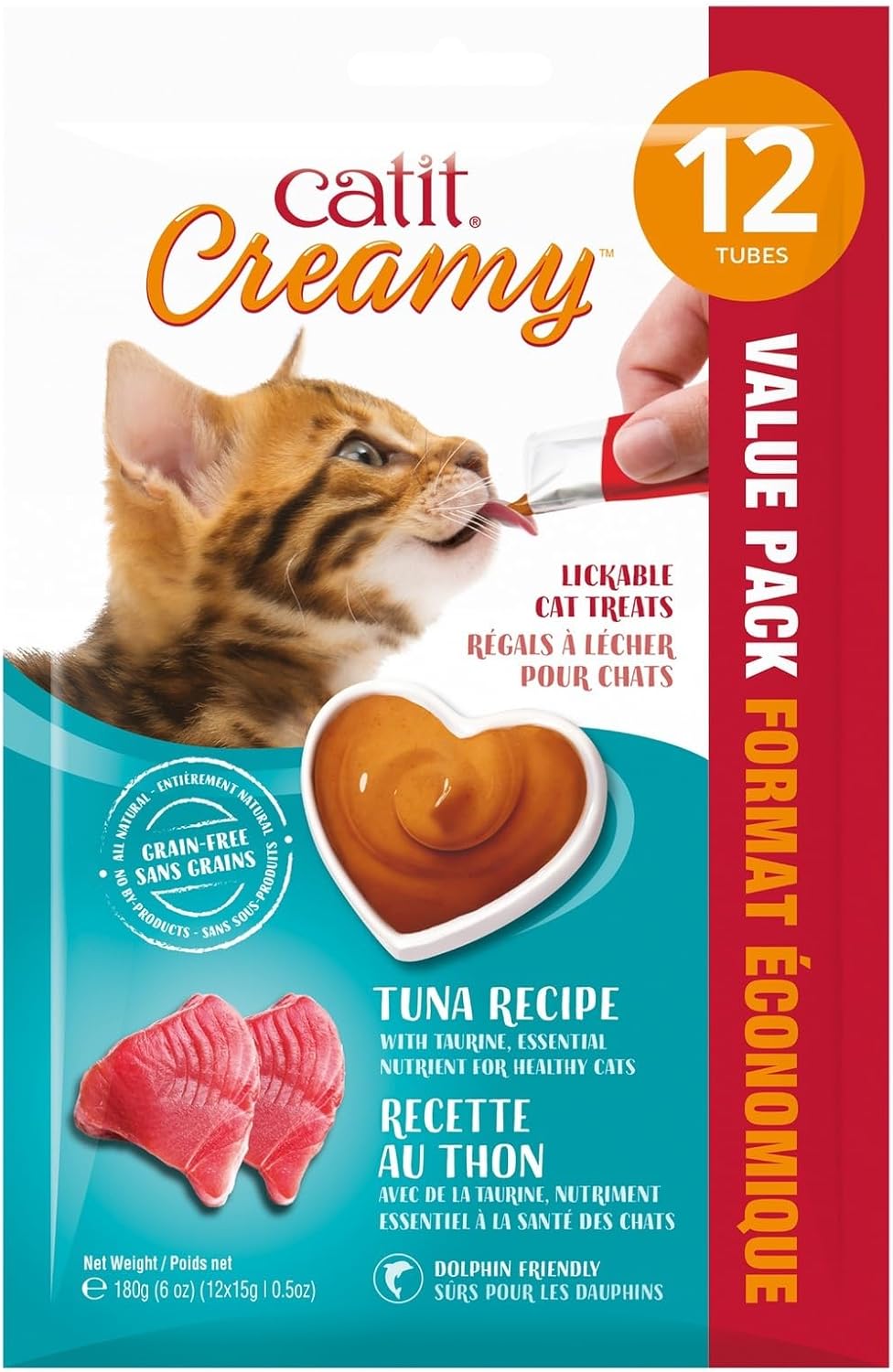 Hand-feeding a cat with a Catit Creamy treat tube