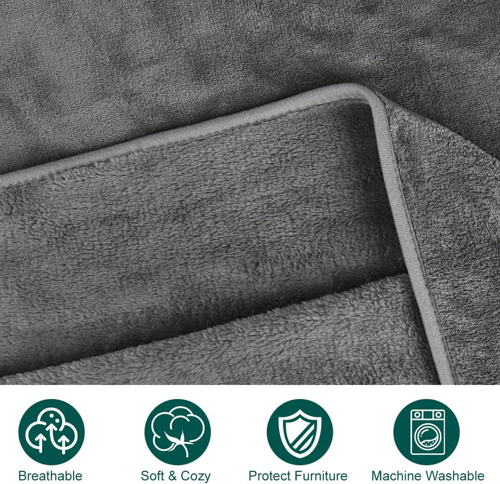 Fleece pet blankets folded inside a travel car seat crate.