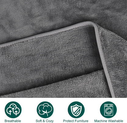 Fleece pet blankets folded inside a travel car seat crate.