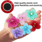 Assorted six count fabric flower accessories styled on a small domestic cat