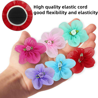 Assorted six count fabric flower accessories styled on a small domestic cat