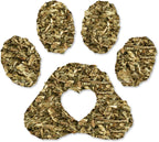 Dried organic catnip leaves and flowers spilled on a table